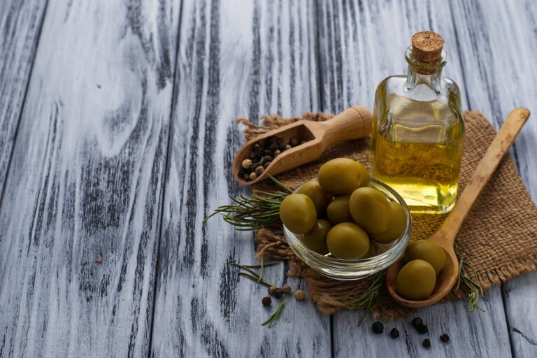 Olives and bottle of olive oil