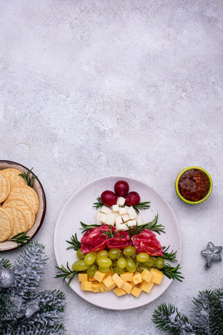 Cheese plate with salami in shape of tree.