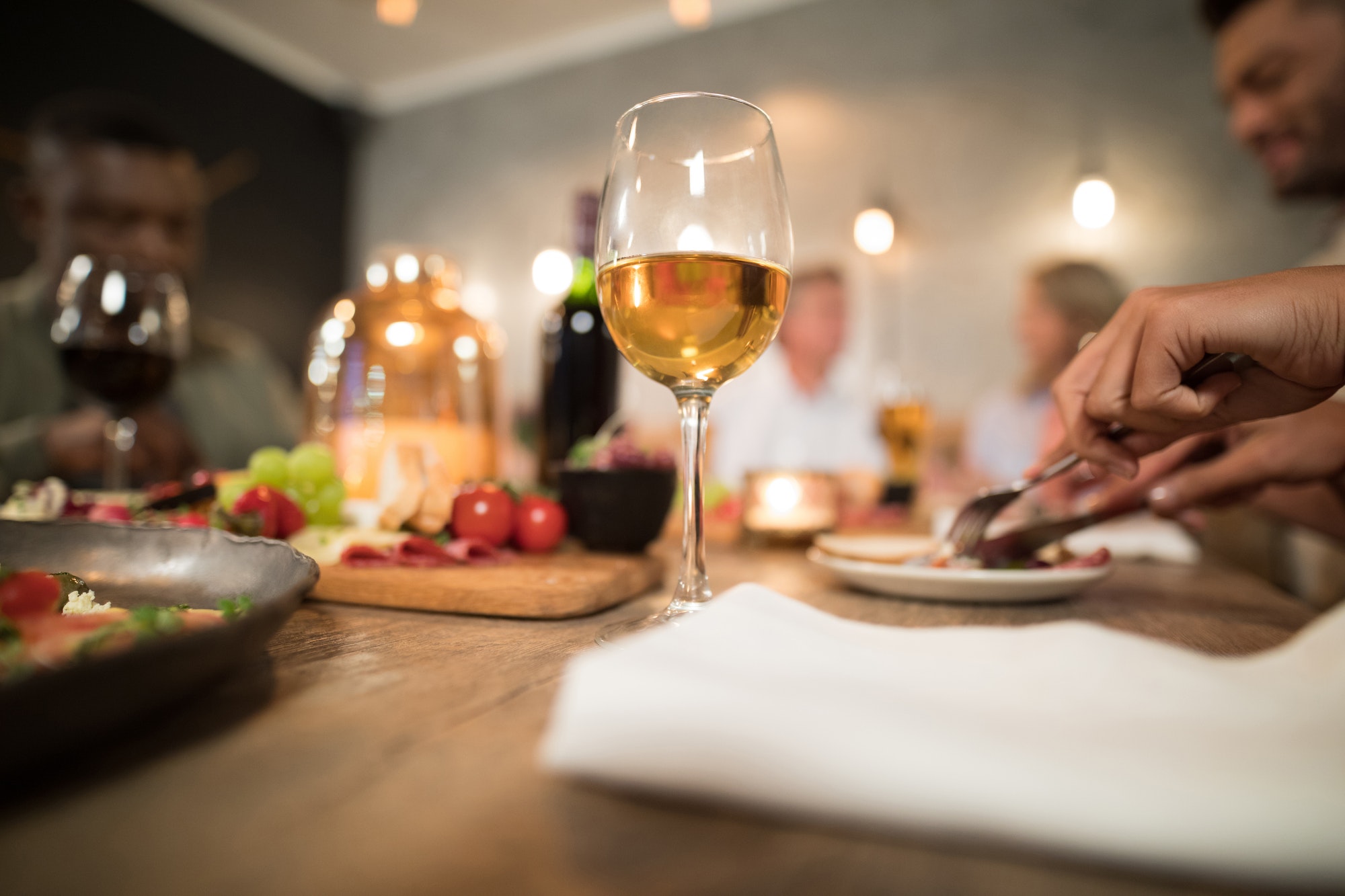 Glass of wine on dining table